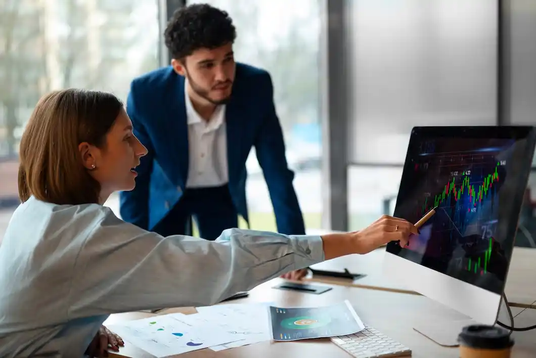People analyzing and checking finance graphs.